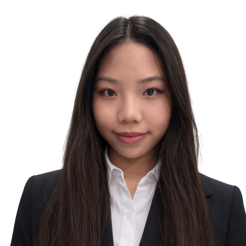 Professional headshot of a woman with long dark hair wearing a black blazer and white collared shirt against a white background.