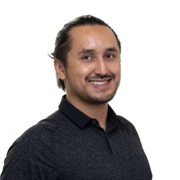 Headshot of Christian Bernal-Cordoba smiling in a black button up shirt